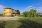 Preview: Rustic dream home in Italy – 3,000 m² surrounded by greenery with panoramic views, farmhouse with green shutters and willow tree.