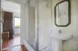 Preview: Rustic dream home in Italy – 3,000 m² surrounded by greenery with panoramic views, bathroom with shower, sink and mirror.