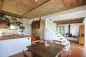Preview: Rustic dream home in Italy – 3,000 m² surrounded by greenery with panoramic views, kitchen with dining table and staircase.